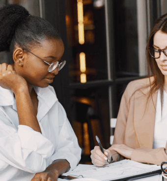 Accountants discussing a Personal and Business Needs Review accounting framework with a client.